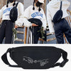 Black linen crossbody waist bag featuring a hand gesture design, shown in lifestyle photos.