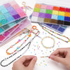 A hand is arranging colorful acrylic rice beads for DIY jewelry, displayed in various trays and strings.