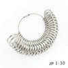 A coiled precision metal ring sizer kit with multiple rings visible.