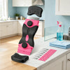 A pink and black 2-in-1 multi-purpose adhesive remover scraper is displayed on a kitchen counter.