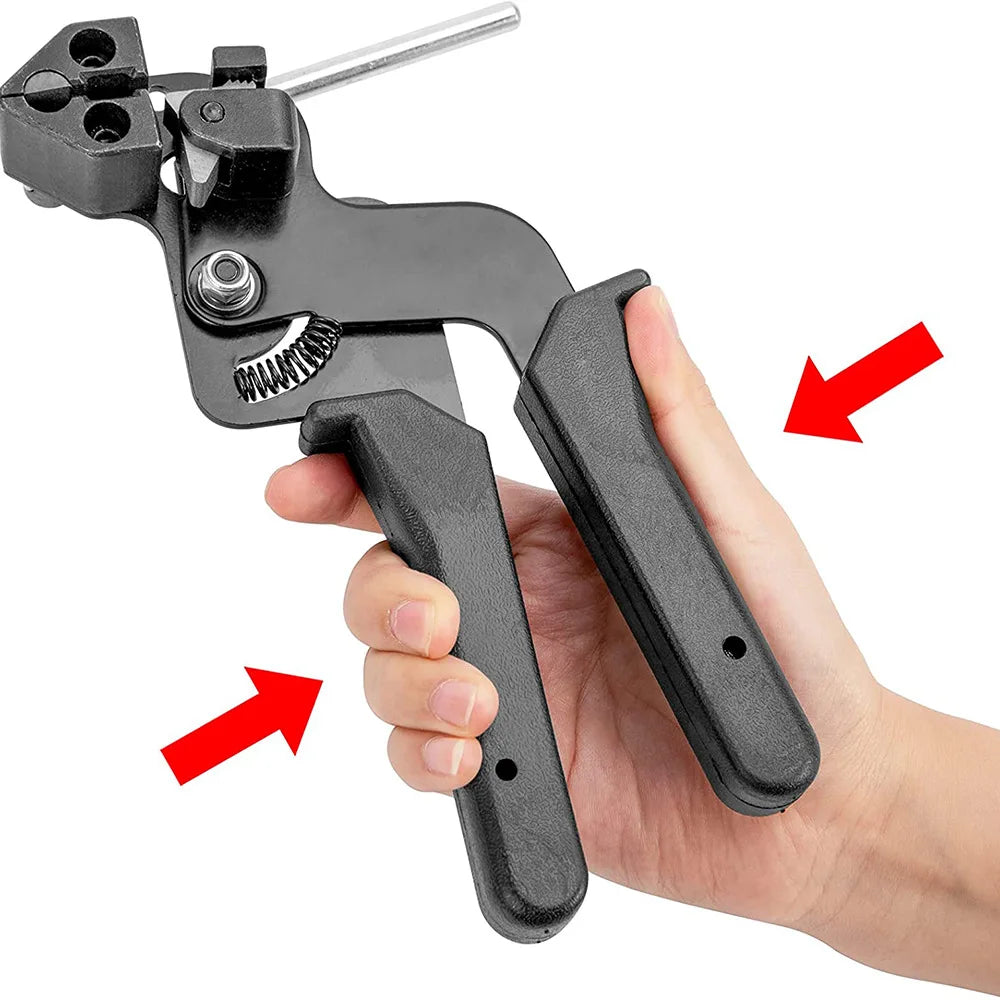 A hand is holding a black stainless steel cable tie cutting tool designed for gripping and cutting zip ties.