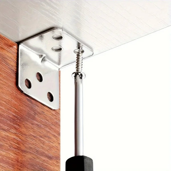 Stainless steel 90 degree corner brackets mounted on a wooden surface