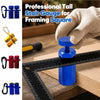 A hand holds a blue professional tall stair gauge used for framing square measurements on a ruler.