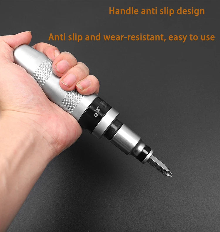 A hand is holding a silver precision impact screwdriver with an anti-slip handle and sharp tip.