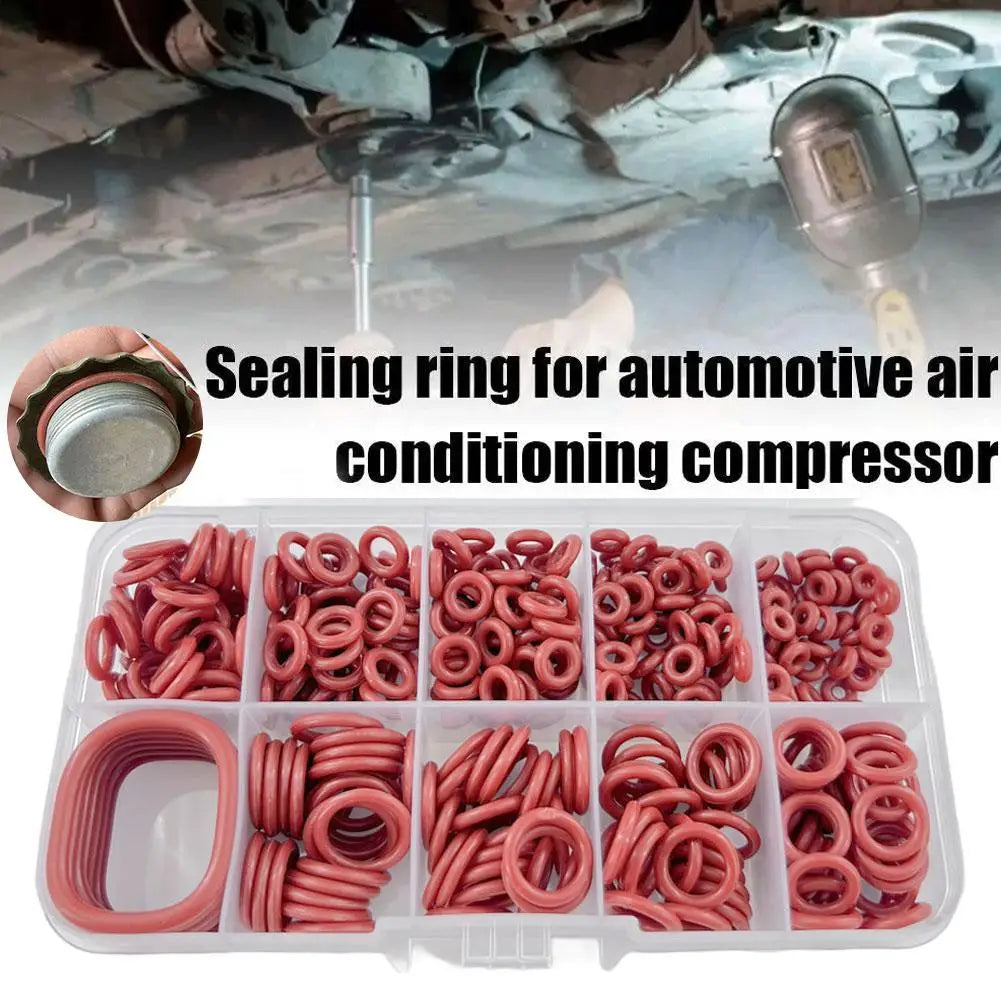 A plastic container filled with various silicone O-rings for automotive air conditioning compressors.