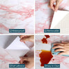 Rollable pink marble contact paper showing waterproof, removable, self-adhesive features and easy to clean application.