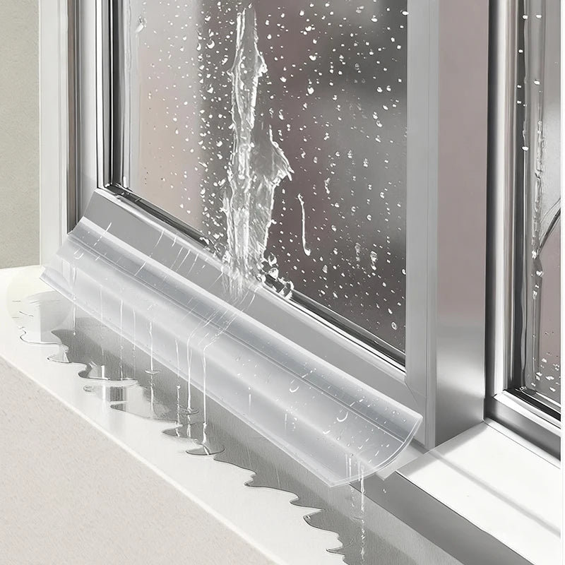 Transparent weatherproofing sealing strips dripping water on a window pane