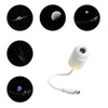 A set of five dark circular images showing celestial bodies and a white projector with a cord.