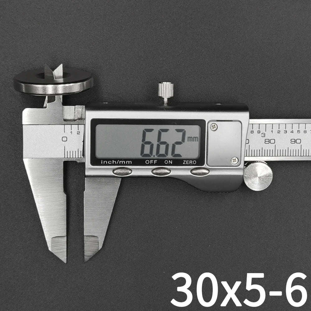 A silver precision disc counter used to measure depth, displaying 6.62 mm.