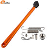 Orange motorcycle side stand kickstand kit with spring and mounting hardware