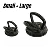 A set of small and large heavy-duty suction cup dent pullers for auto body repair.