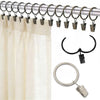 A set of metal curtain rings and clips used for hanging curtains.