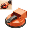 An orange heavy duty suction cup floor gap fixer tool with a black handle and base.
