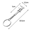 A silver metal jewelry measuring ruler and caliper keychain with a loop and a small tool visible.
