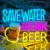 Neon sign spelling out SAVE WATER DRINK BEER with a beer glass and surrounding foliage.