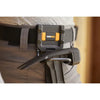 A close-up of a ToughBuilt modular hanging hammer tool attached to a belt, showing its gray and orange components.