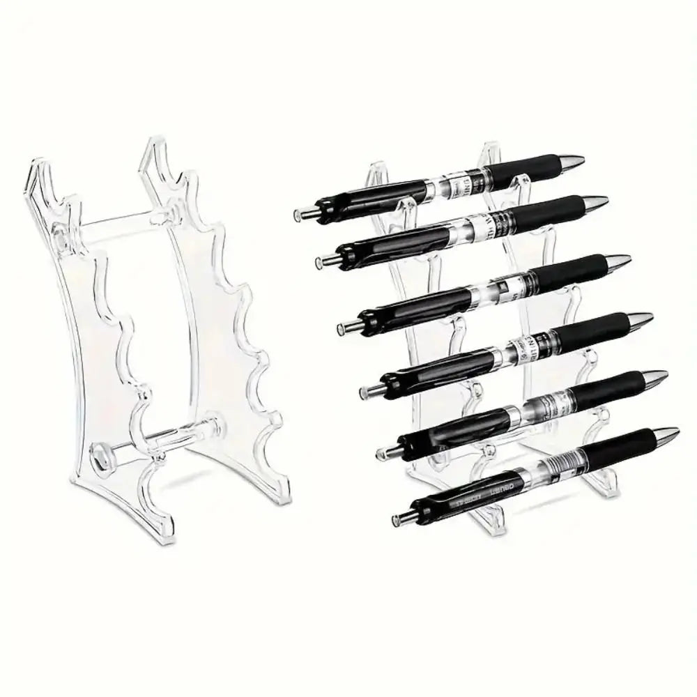 A clear plastic organizer holding multiple black ballpoint pens.