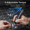 A hand holds a black cordless wireless soldering iron kit applying solder to a circuit board.