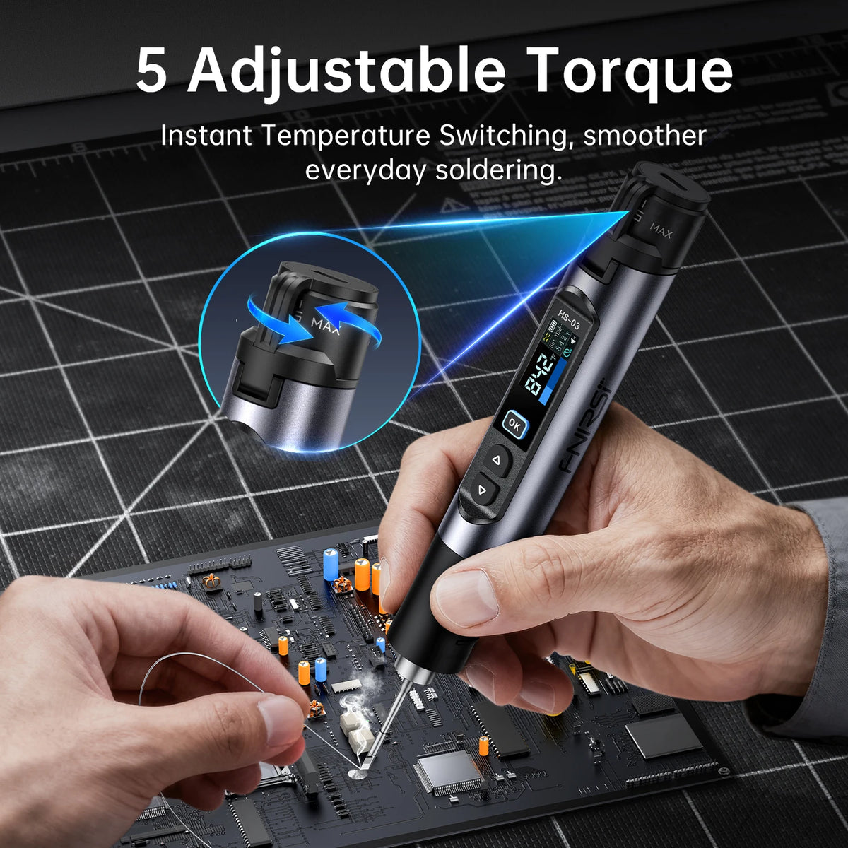 A hand holds a black cordless wireless soldering iron kit applying solder to a circuit board.