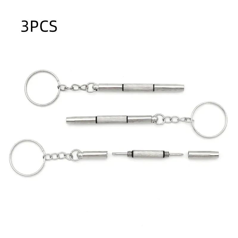 Three pieces of a precision multi-purpose eyeglass repair screwdriver kit with various tools and loops