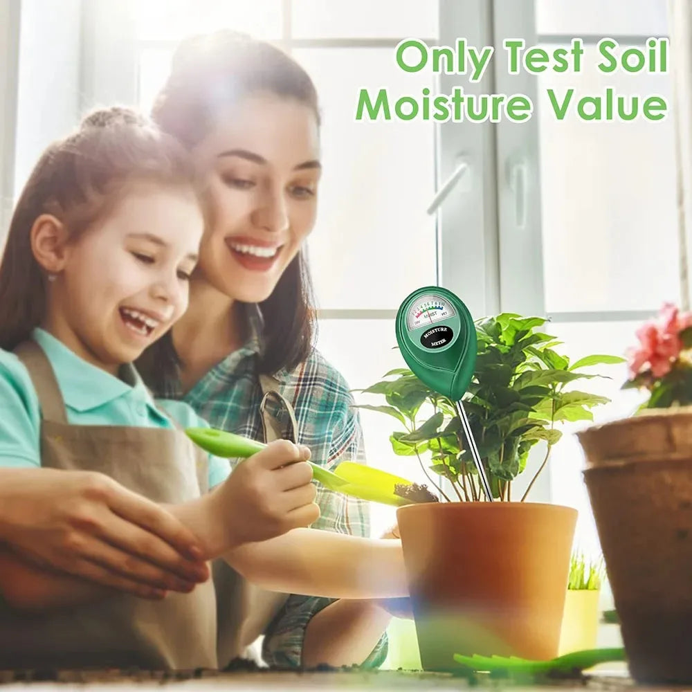 A woman and a girl are testing soil moisture using a portable meter in a potted plant.