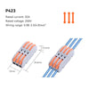 A set of orange and blue electrical push-in connectors with wire insulation and terminals.