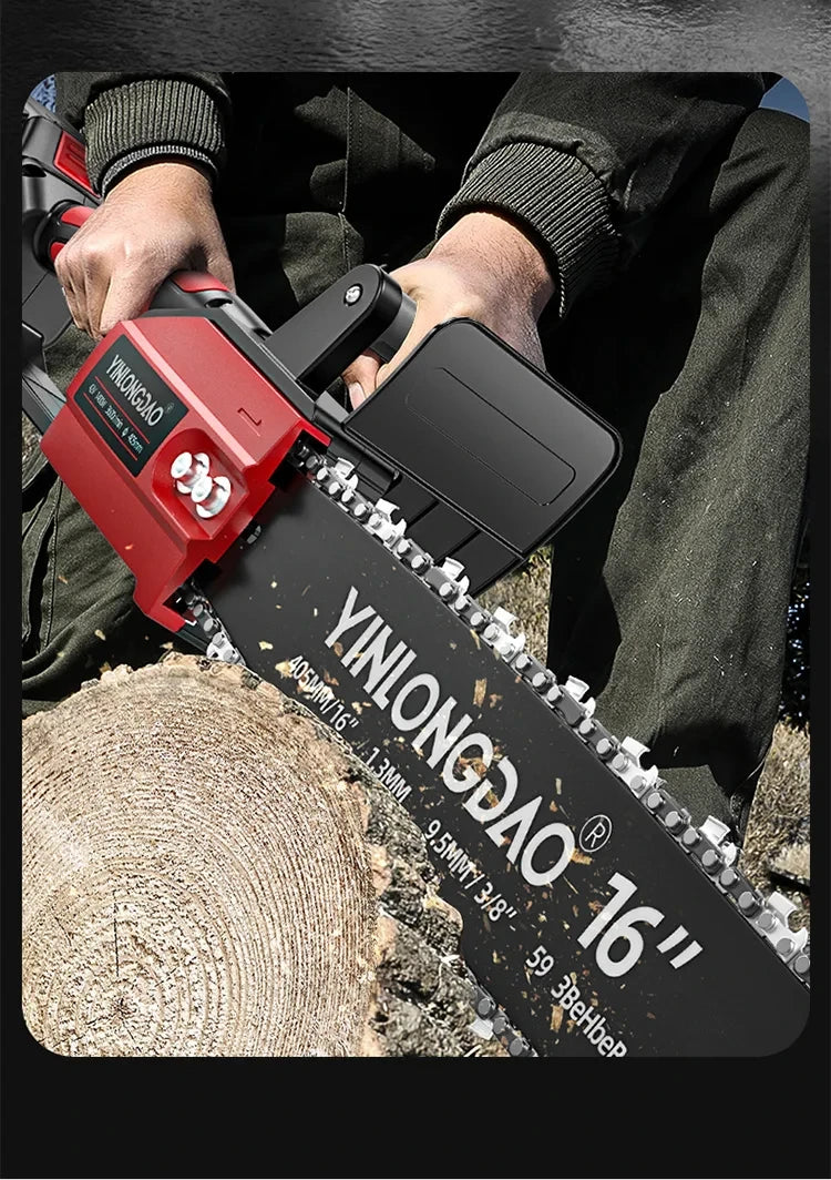 A person is holding a red mini electric chainsaw with replacement chains, showing the blade and handle.