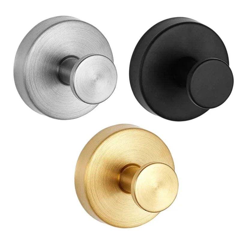Three shower hooks in silver, black, and gold finishes shown from above.
