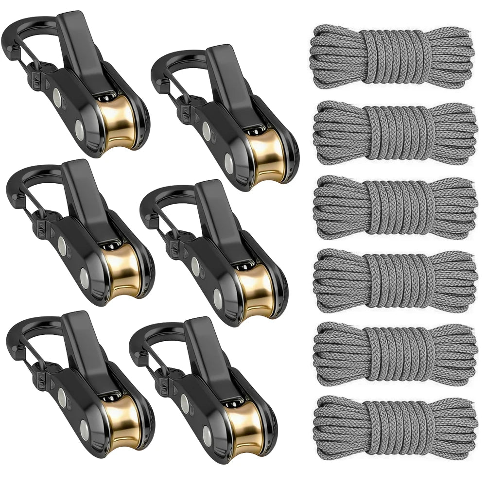 A set of black and gold retractable paracord rope fasteners and tensioners.