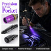 A man uses a compact multi-spectrum UV flashlight to inspect the interior of a car engine.