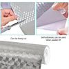Rouleau de papier d'aluminium argenté avec autocollants muraux à motif géométrique et exemples de coupe et de décollement