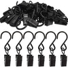 A collection of black stainless steel curtain clips with various hook and clamp designs.