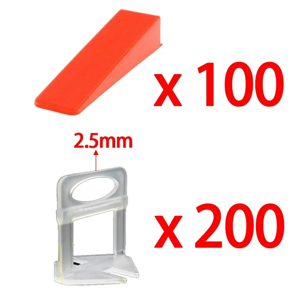 A set of red tile leveling strips (100 pieces) and clear plastic spacers (200 pieces) for professional tile work.