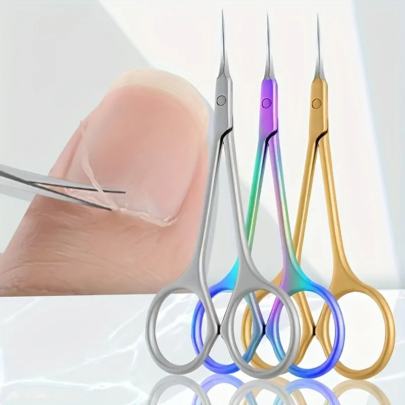 A hand holds various precision stainless steel cuticle and nail clippers in different colors like silver, purple, and gold.