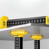 A precision ceiling leveling tool with a black ruler and yellow mounting brackets is shown against a white background.