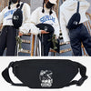 Black linen crossbody waist bag featuring a roaring dinosaur design for everyday essentials