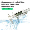 A digital vernier caliper showing a measurement of 10.38 mm, used in a workshop environment.