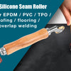 A hand is holding a 40mm silicone seam roller with a wooden handle and a red roller, used for welding various materials.