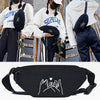 Black linen crossbody waist bag featuring a white outline of a heart-shaped hand print