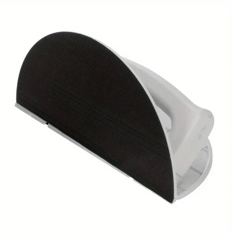 A black self-adhesive half circle sanding pad holder with a white plastic base.