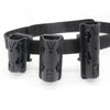Black tactical baton and flashlight holder mounted on a black strap.