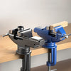 A heavy duty 360° rotating table vise in gray and blue metal is shown mounted on a wooden surface.