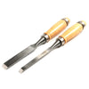 A professional wood carving chisel set with wooden handles and metal blades.