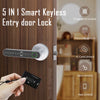 A hand holds a black card near a smart fingerprint entry door lock installed on a wooden door.