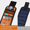 Black magnetic wrist strap tool with two pockets designed to hold non-magnetic parts