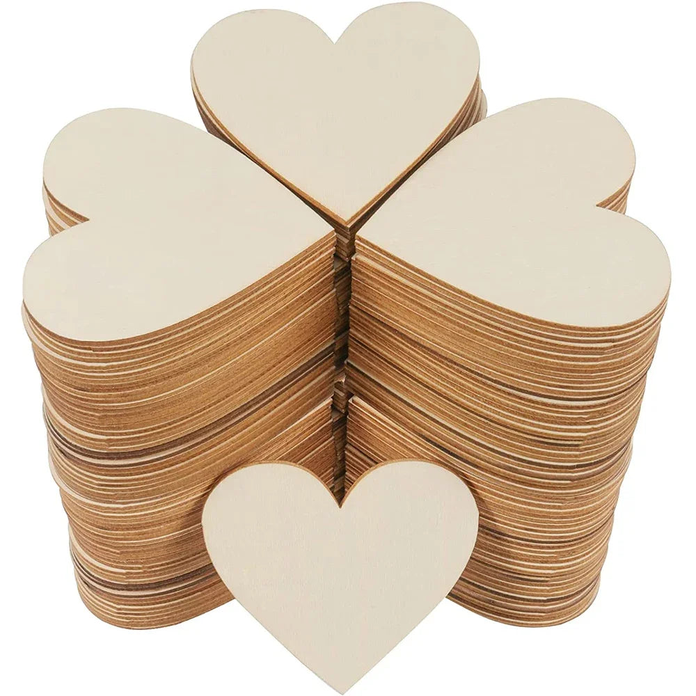Stacks of unfinished wooden heart-shaped slices for DIY crafts