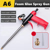 A black and red foam glue spray gun with various parts shown, including a nozzle and plunger.