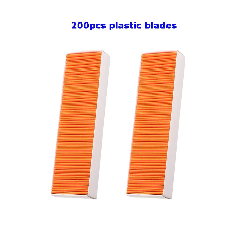 Two rectangular strips of orange plastic blades for scraping labels and decals
