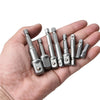 A hand holds a set of multi-sized drill socket adapters for impact drivers.