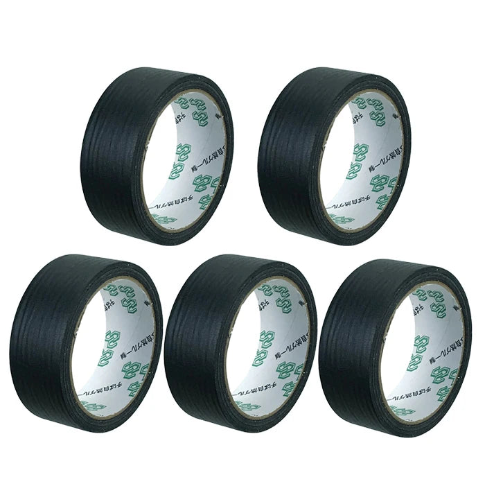 Four rolls of black painter's masking tape applicator rolls shown from the side.